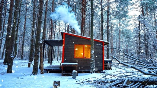 The forest house an off grid cabin in the icy woods has gotten even cozier with the thaw and snow. | Wright