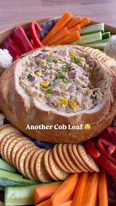 Cowboy Cob Loaf 🤠🌽🥓 25 days of Christmas Recipes INGREDIENTS * 1 medium cob loaf * 1 onion, finely chopped * 500g streaky bacon, chopped * 50g sun-dried tomatoes, finely chopped * 420g can corn kernels, drained * 125g sour cream * 250g cream cheese * 1 onion soup sachet, 35g * 1 cup milk * 100g mozzarella, grated * 2 spring onions * 1 Tbsp chipotle sauce, optional TO SERVE * Raw vegetables, sliced to serve * Crackers, optional INSTRUCTIONS 1. Cob loaf: Preheat the oven to 170°C fan bake. 2. C
