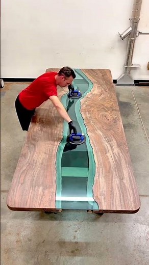 Installing glass into a wooden table using tools