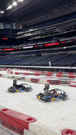 High-performance electric karts sliping and sliding inside Lucas Oil Stadium at the Performance Racing Industry - #PRIShow #LucasOilStadium #PRI2023 #Electric #Karts | JP Pulling Productions