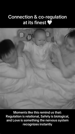 Holistic Sleep & Parenting Coaching Institute | IPHI on Instagram: "An 18-month-old resting between two parents. Smiling. Relaxed. Regulated. Safe. This isn’t about sleep rules. It isn’t about habits or labels. And it isn’t about doing things “right” or “wrong.” This is secure attachment in motion. This is co-regulation, a child’s nervous system settling because safety is felt, not taught. This is connection happening in real time. Across much of the world, shared sleep is not controversial, it’