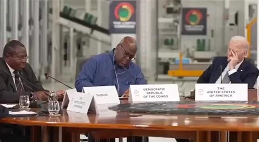 Joe Biden appears to fall asleep during summit.