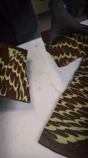 FrischSchoggi Dark Mint has arrived🌿 🍫 Love mint chocolate? Don’t miss our new FrischSchoggi Mint Dark, crafted in small batches with freshly poured dark chocolate, caramelized almonds, and organic dried mint. Crisp, cooling, and refreshingly bold—this limited edition flavor offers a long, lingering mint finish unlike anything else. Available for a short time only. #LoveLaderach #EliasLaderach #FrischSchoggi #MintDark #MintChocolate #ChocolateFactory #ChocolateLover #Foodie | Laderach Jordan