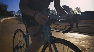 Cyclist riding on a cycling track outdoors - Free Stock Video
