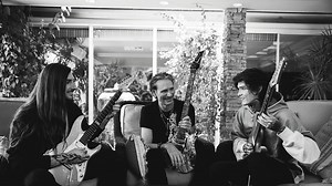 Polyphia’s Tim Henson and Scott LePage sit down with Steve Vai to discuss their epic collaboration, the evolution of awe-inspiring technique and a one-of-a-kind guitar gift