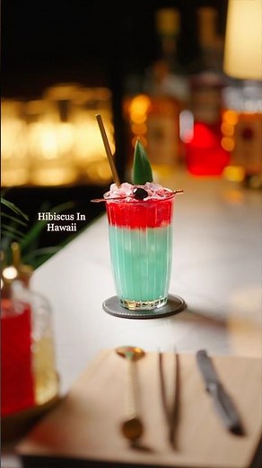 Hibiscus in Hawaii: A Blue Hawaiian cocktail recipe twist with rum, gin, ginger & hibiscus