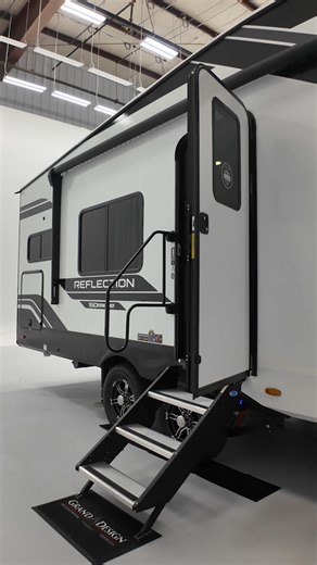 Experience the perfect blend of comfort and style with the 2026 Grand Design RV Reflection 150 Series 250ML. This fifth wheel is designed to elevate your adventures with its thoughtful layout and luxurious features. ▫️Theater Seating ▫️Queen Bed ▫️Unobstructed Pass-Thru Storage ▫️Fireplace Discover more about the Reflection: https://generalrv.com/grand-design/reflection-150-series?utm_source=ig&utm_medium=Social&utm_campaign=Reel | General RV Center