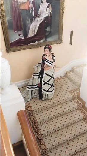 Victorian 1870s bustle ballgown. A "Beauty and the Beast" moment in a beautiful ballroom!