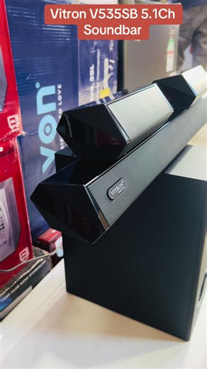 #Vitron V535SB 5.1Ch Soundbar with Subwoofer | Surround Sound System. Vitron V535SB 5.1Ch Soundbar with Subwoofer | Surround Sound System KEY FEATURES Powerful 5.1 Channel Surround Sound – Enjoy immersive cinematic audio at home. High-Quality Subwoofer – Deep bass for an enhanced listening experience. Bluetooth Connectivity – Stream music wirelessly from your smartphone, TV, or laptop. Multiple Input Options – Supports USB, AUX, HDMI ARC, Optical, and FM radio. Remote Control Included – Easy con