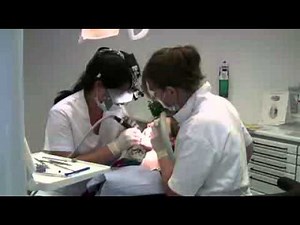 Drilling dentist young mfemale patient