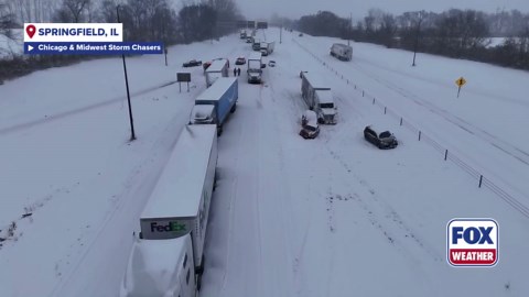 Drone video shows multi-vehicle pileup on Interstate 55 during snowstorm in Illinois