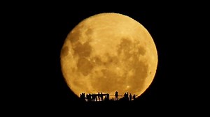 Photographer Captures Stunning Footage of Silhouettes in Front of a Rising Moon