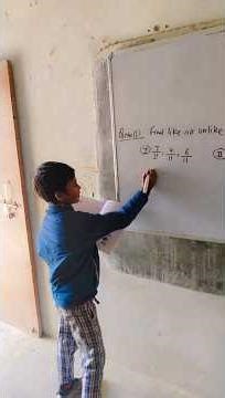 English medium ke 3rd class ke student maths ke question solve krte hue