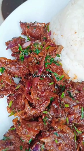 Simple Beef dry fry recipe. Ingredients. Beef. Bay leaves. Salt. Beef cubes. Soy sauce. Dania. Crushed garlic and ginger. Cooking oil. Beef masala. Onions. *Boil the beef with salt, crushed garlic and ginger and bay leaves. *Boil the meat till tender and all the water has dried up. *Fry the beef with some oil till brown. *Add the onions and crushed garlic and ginger. Cook till the onions are soft. *Add the beef masala and beef cubes. Cook the spices for a few minutes. *Finish with dania *Serve w