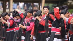 23K views · 275 reactions | A village known for the exceptionally long hair worn by the women. Take a glimpse of Huangluo Village in Guangxi, China, where long hair is a symbol of longevity. | China Xinhua News | Facebook