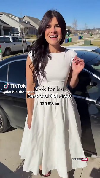 Replying to @double.the.trouble.trend this holiday midi dress is stunning and such good quality for less! True to size #mididress #dresses #holidaydress #backlessdress #christmas