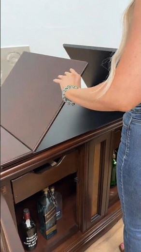 Vintage Bar Cabinet with a Unique Flip-Top Design