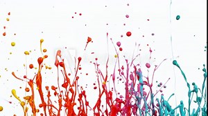 Colorful splashing paint in super slow motion.