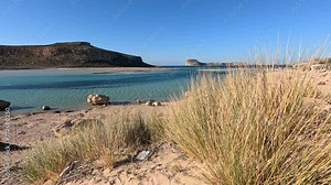 Amazing view of Balos Lagoon with magical turquoise waters, lagoons, tropical beaches of pure white sand and Gramvousa island on Crete, Greece