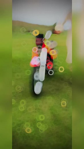 Performing Stunts on a Black and Red Motorcycle