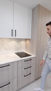 Dont settle for an ugly stainless steel setup near your secondary cooktop, just hide it in the cabinetry, but keep everything accesible and sleek! | Thekitchenguy