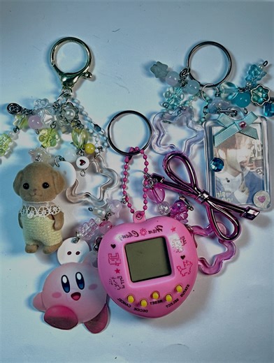 Cina jawllery | Keychains drop🎼🌀💘 - 1. Original sylvanian family puppy keychain (with it’s box ) , 1200da 2. Kirby Tamagotchi keychain 1300da 3.txt blue... | Instagram