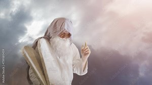 The Old Testament biblical prophet Moses holds the tablets with the ten commandments