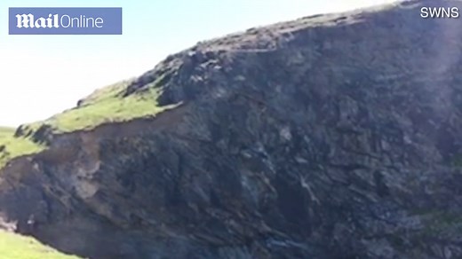 Dramatic moment huge rock falls from cliff in Cornwall