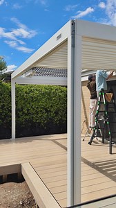 New level unlocked 🔓 Installing our new @pergolux.au SUNDREAM S3 bringing large vibes to our backyard reno 👌🏼 Can’t wait to style this space out! 🫣 Pergolux Black Friday is coming soon — sign up now to get a great deal! 📝 🛒 #backyardreno #reno #renovation #backyard #decking #pergola #pergolux #louveredpergola | HAUS OF CRUZE