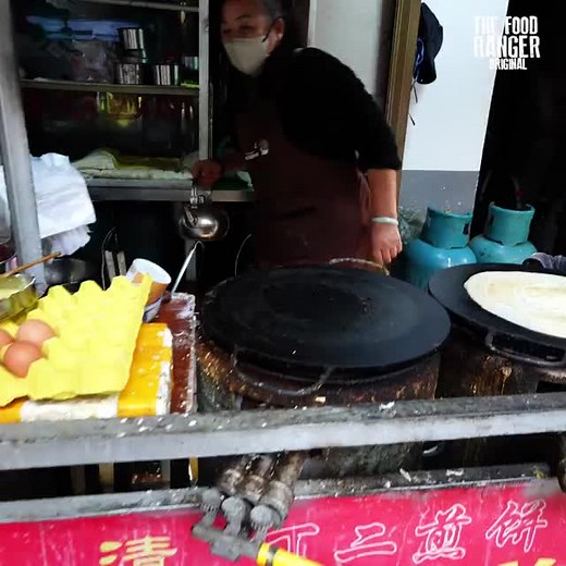 Plump Chinese Breakfast Pancake with Chili Oil and Peanuts