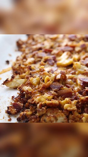 Loaded Roasted Cauliflower Recipe With Cheese and Bacon is so delicious, quick, and easy. This recipe gives you the crunch you sometimes miss on keto, while also adding extra veggies and fat to your diet. The cauliflower florets are roasted in the oven with spices and pork panko to make a delicious cauliflower dish. Recipe >> https://kaseytrenum.com/roasted-cauliflower-recipe/ | Easy Keto/Low Carb Recipes