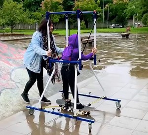 Kid with cerebral palsy skateboards for first time with help from mom and technology