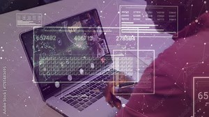 Man tapping trackpad and sliding over laptop, causing financial HUD panels to update charts