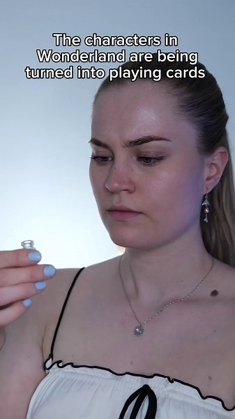 Wonderland Characters Turned into Playing Cards: A Curse in Alice in Wonderland