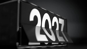 Black Flipping Calendar Changing Years from 2025 to 2040 with Selective Focus