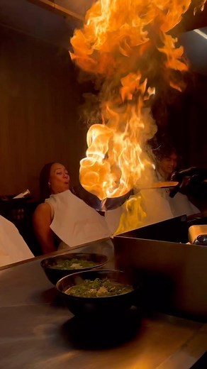 ⬇️SAVE FOR YOUR JAPAN BUCKET LIST 🇯🇵 When they told us to put on our fire retardant bibs, put our hands behind our backs and lean back I knew it was going to be something wild 🤣. @menbakaichidai in Kyoto is one to add to your list if you love unique dining experiences! It’s good value too. My ramen with rice, fried chicken and gyoza was £12.50! #japan #travelblogger #traveltoeat #kyoto #ramen #japanesefood | Loulouexplores