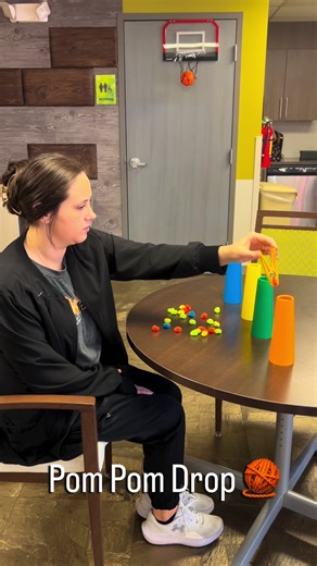 🧠🎨 Color Match Clothespin Pom Pom Activity This activity targets hand strength, fine motor coordination, and visual discrimination by having the client use a resistive clothespin to pick up pom poms and release them into the matching color cone. ✨ Skills addressed: • Intrinsic hand strength • Pincer grasp & pinch strength • Bilateral coordination • Hand-eye coordination • Color recognition & visual scanning • Graded force control (open/close clothespin) 🔄 How to grade: • Increase resistance o