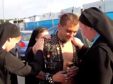 Nuns performing exorcism on a punk.