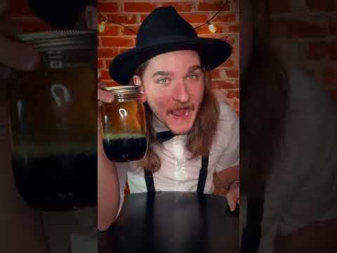 Making Sour Whiskey: leaving a Warhead Sour Candy in whiskey for a week