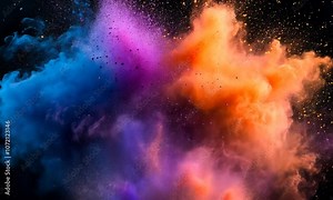 Colored powder exploding on a black background