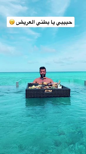 Leisurely Floating Breakfast in Clear Blue Ocean