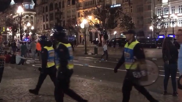 England fan throws bottle at police as they gather in Porto for Nations League