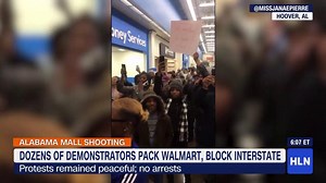 "If we don't get no justice, you don't get no peace." Protesters chant inside a Walmart & briefly block an interstate demanding charges for the police officer who shot & killed E.J. Bradford on Thanksgiving at a mall in Alabama. | HLN