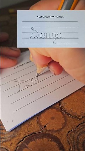 How do you write Souza using PRACTICAL CURSIVE WRITING?