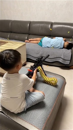 Dads really know how to buy toys for their sons—I ended up playing with it all night myself. #ToyGun