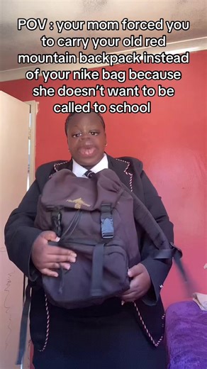 The Struggle of Carrying an Old Red Mountain Backpack