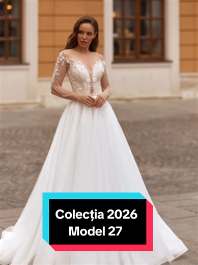 👗Rochie de mireasa A-line spectaculoasa, creata pentru mireasa care isi doreste eleganta, stralucire si un look curat in ziua nuntii. Bustul din dantela bogata cu aplicatii 3D si perle aplicate manual evidentiaza frumos decolteul adanc cu efect transparent. Maneca lunga din tulle fin adauga rafinament si echilibru vizual.✨️ Fusta ampla din tulle moale cade fluid si formeaza o trena delicata, foarte fotogenica. Spatele impresioneaza prin jocul de transparente si broderii aplicate simetric, compl