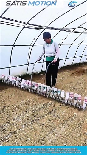 Pushing Manual Seeder Tool in Straight Motion Creating Even Soil Lines