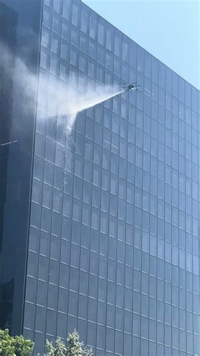 Drone Power-Washes Los Angeles Building