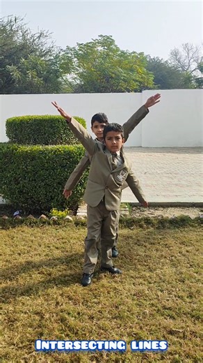 🙌 Hands-On Math Magic! 🙌 Our little learners didn't just look at lines and angles today—they demonstrated with their arms...📐✨ They used our hands and arms to master geometry: 👉 Parallel lines with straight arms! 👉 Right angles with a perfect "L" shape! 👉 Acute angles & Obtuse angles with big, wide stretches! It’s amazing how much easier math is to understand when you use your body to bring it to life. Check out these awesome "human shapes" in action! 🧠💡 #KinestheticLearning #EarlyMath #